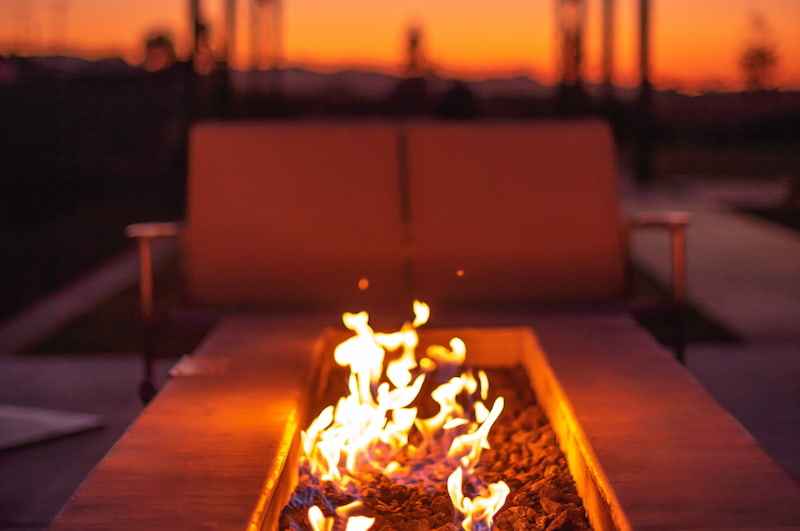 Outdoor fireplace at sunset
